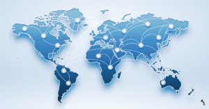 Diverse group of university leaders and students from different countries sitting around a table or connected via large digital screens; world map visible in background with connection lines between countries; laptops showing virtual classrooms and international collaboration tools; represents cross-border education and global university partnerships