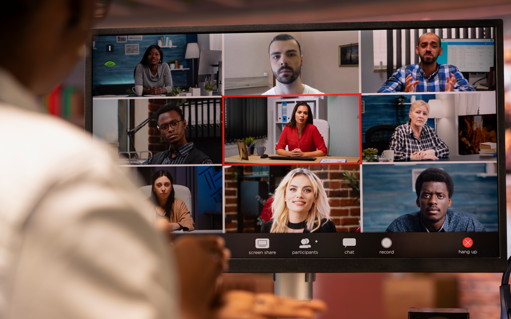 Students from different countries attending a live online class; 

grid-style video call with diverse participants; 

shared digital platform visible; 

represents technology enabling transnational education 